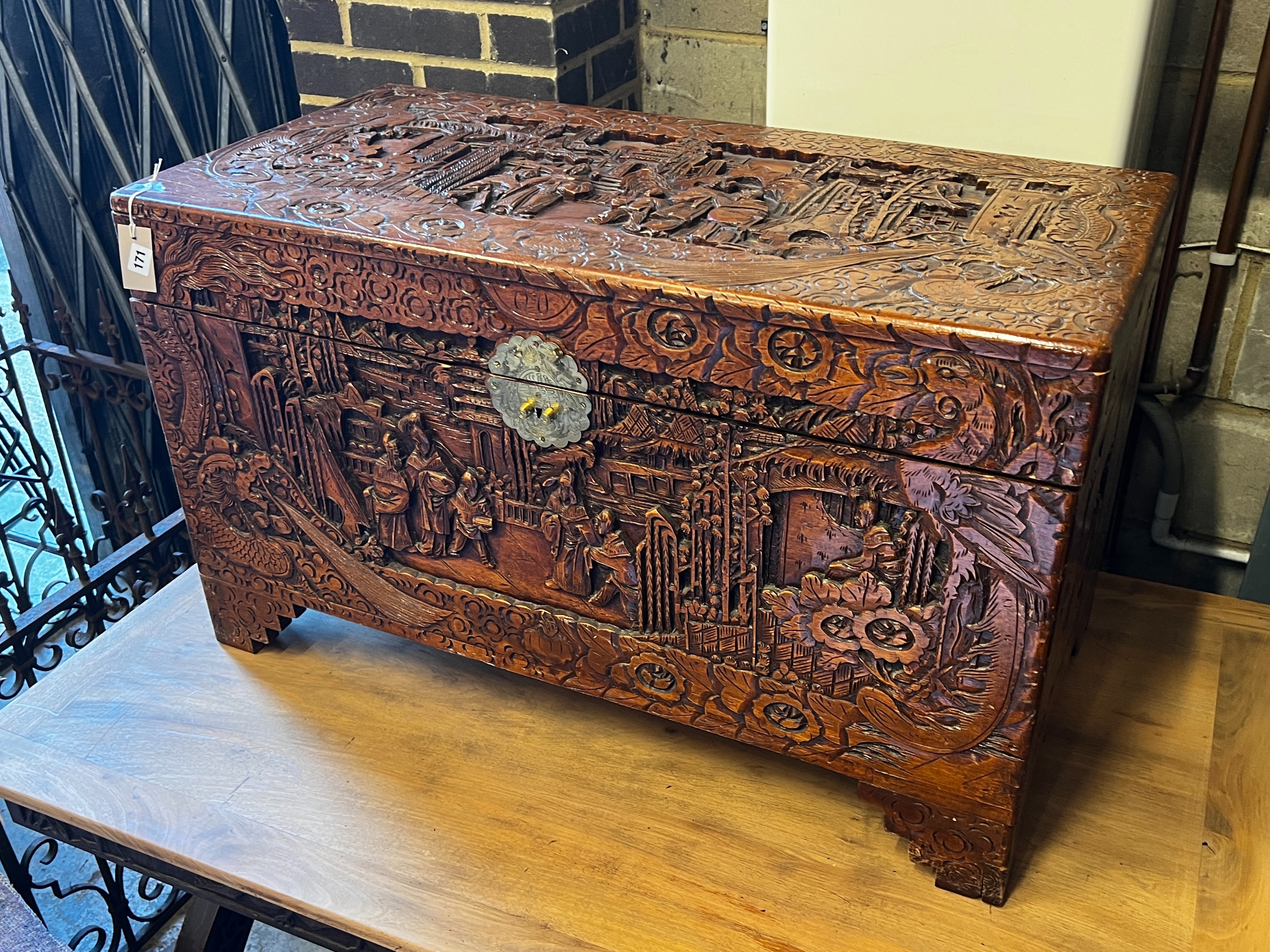 A Chinese carved camphorwood trunk, length 100cm, depth 50cm, height 60cm